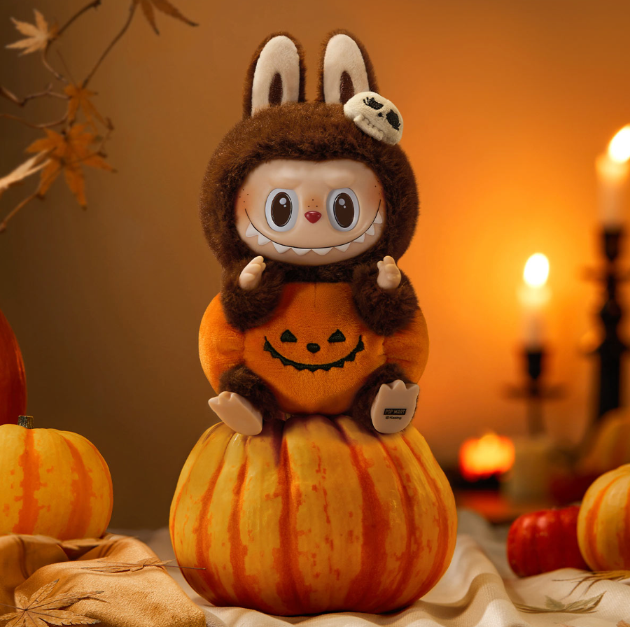 Pop Mart Labubu Happy Halloween Party Series Sitting Pumpkin Vinyl Plush Pendant sitting on pumpkin